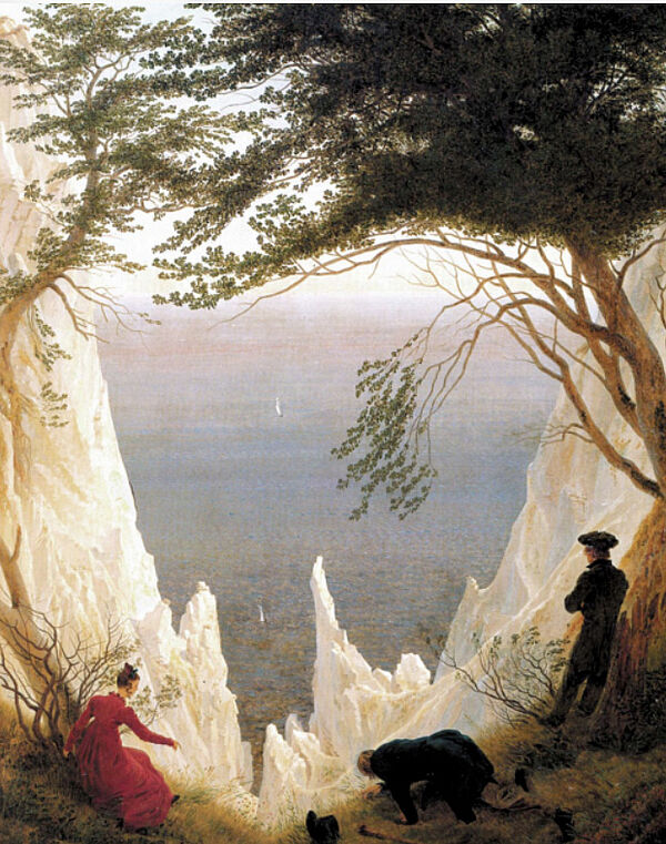 Ein weißer Felsen. Auf dem Felsen sind drei Menschen. Zwischen den Felsen ist Wasser. Auf dem Felsen stehen Bäume.