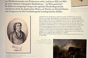 Eine Infotafel mit einem Bild von August Achilles. Neben dem Bild steht Text. 