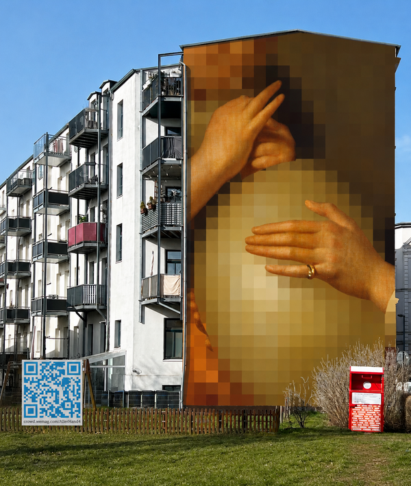 Ein riesiges Bild auf einer Hauswand. Das Bild zeigt Hände.