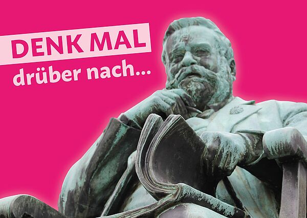 Ein Postkartenmotiv. Auf der Karte ist das Denkmal von Fritz Reuter zu sehen.