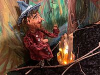 Rumpelstilzchen am Feuer