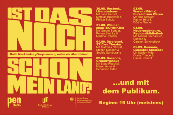 Ein Plakat kündigt in grellen Farben die nächsten Veranstaltungen an.