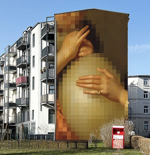 Ein riesiges Bild auf einer Hauswand. Das Bild zeigt Hände.