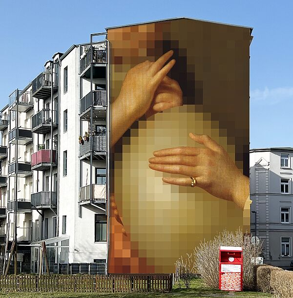 Ein riesiges Bild auf einer Hauswand. Das Bild zeigt Hände.